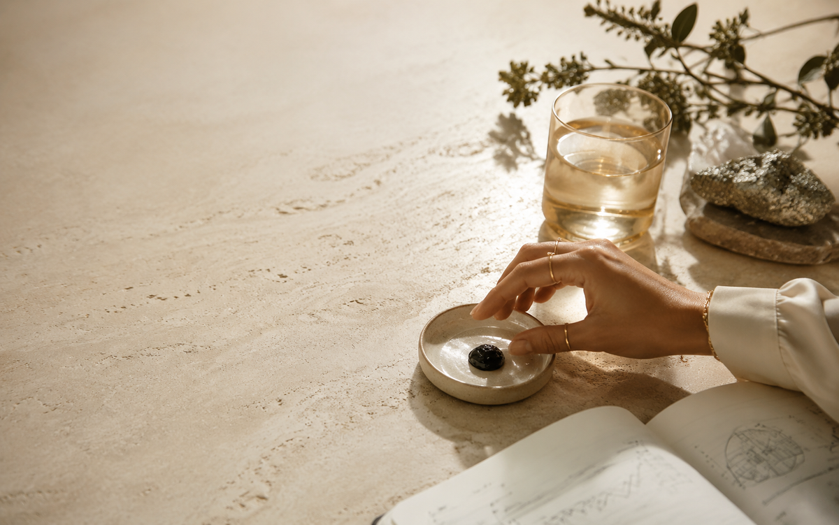 Editorial shilajit research ritual with resin, mineral water and botanical study setting
